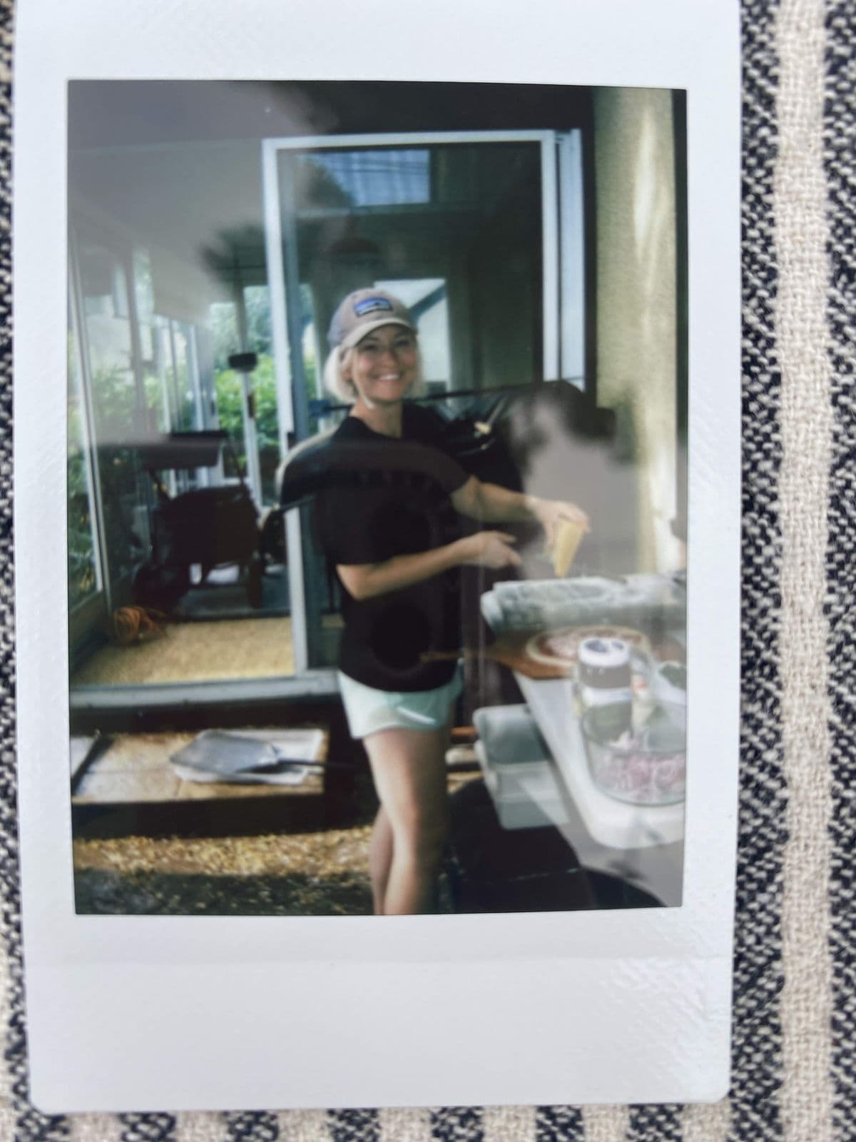 Polaroid of a finished pizza